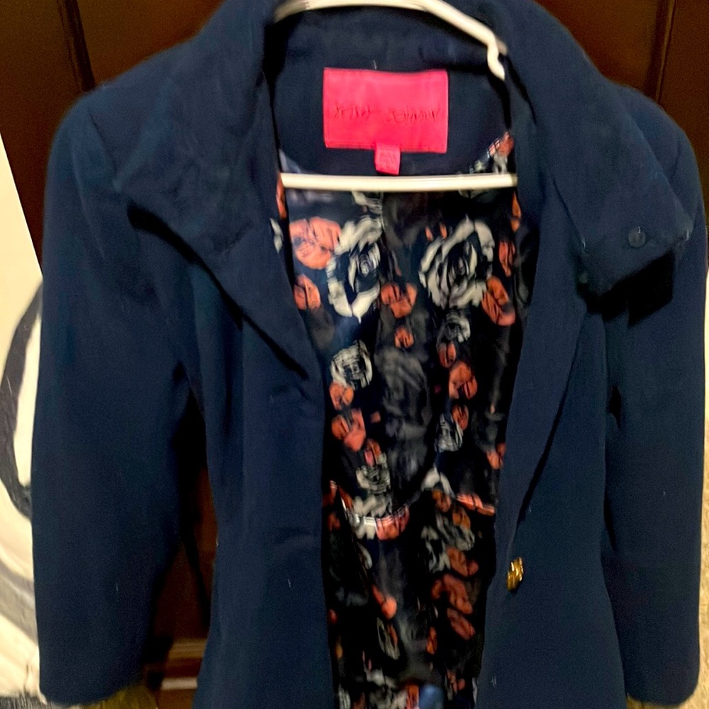 Pea coat that is Navy blue with floral satin inside along with god rose buttons